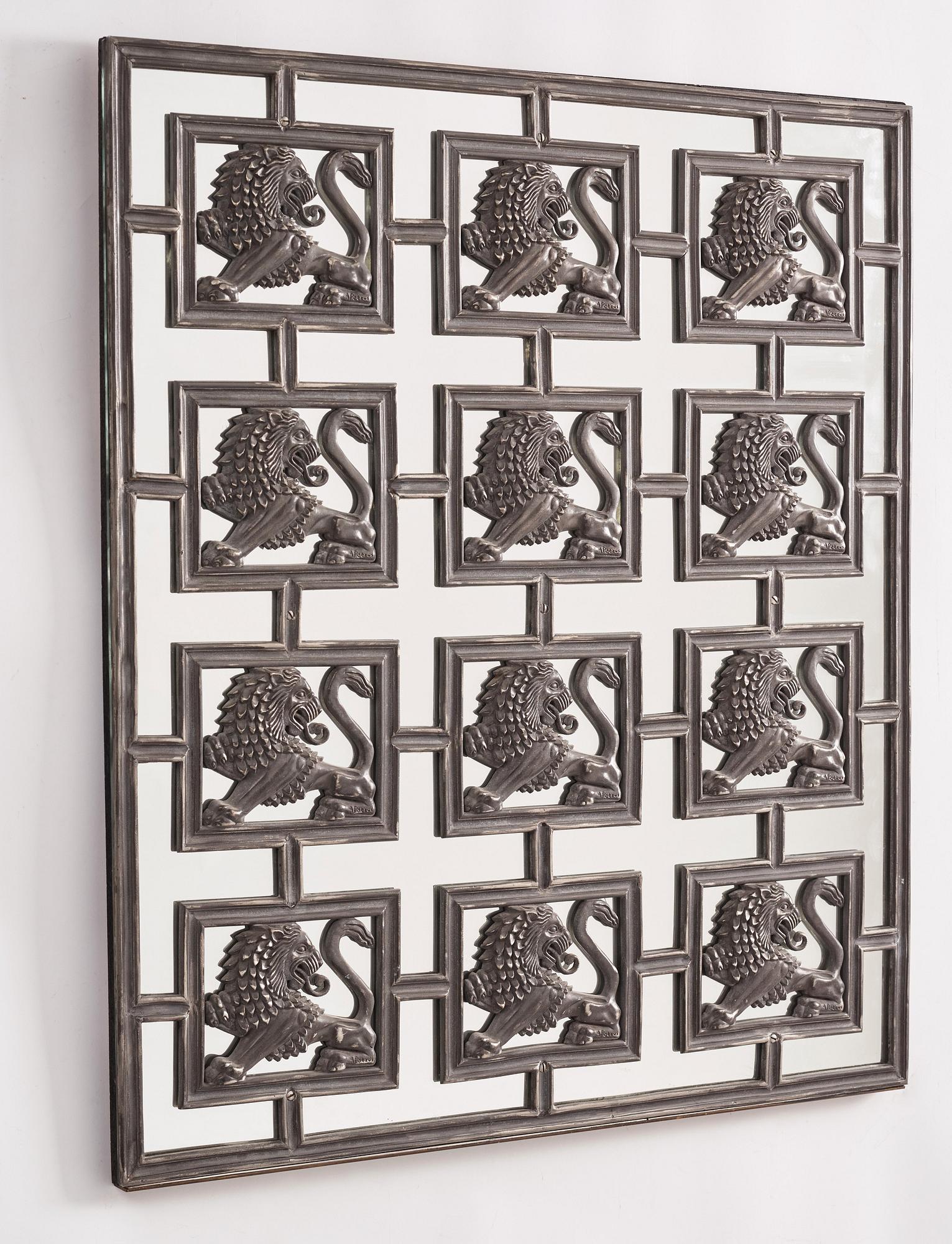 Uno Åhrén & Anna Petrus, a pewter mirror,  Svenskt Tenn, Stockholm, model 516, designed in 1927.