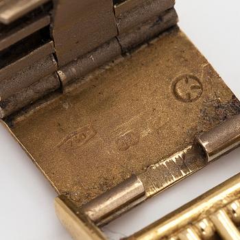 IWC (International Watch Co.), 31 mm, 18K gold, quartz.