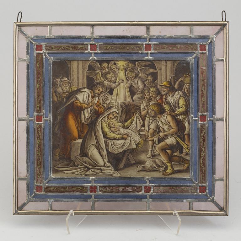 A pair of stained glass windows, circa 1900.