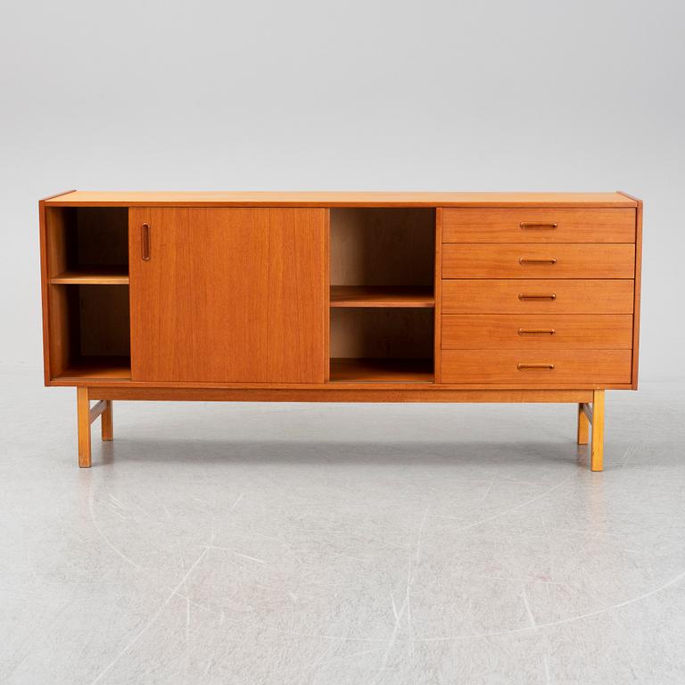 A second half of the 20th century teak veneered sideboard.