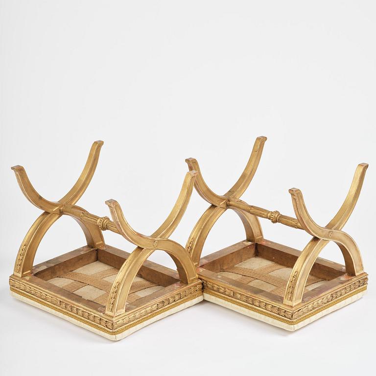 A pair of late Gustavian giltwood stools, Stockholm, late 18th century.