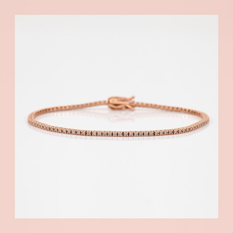 ARMBAND, ett riviére i rosa guld med briljanter, totalt ca 0.99ct.