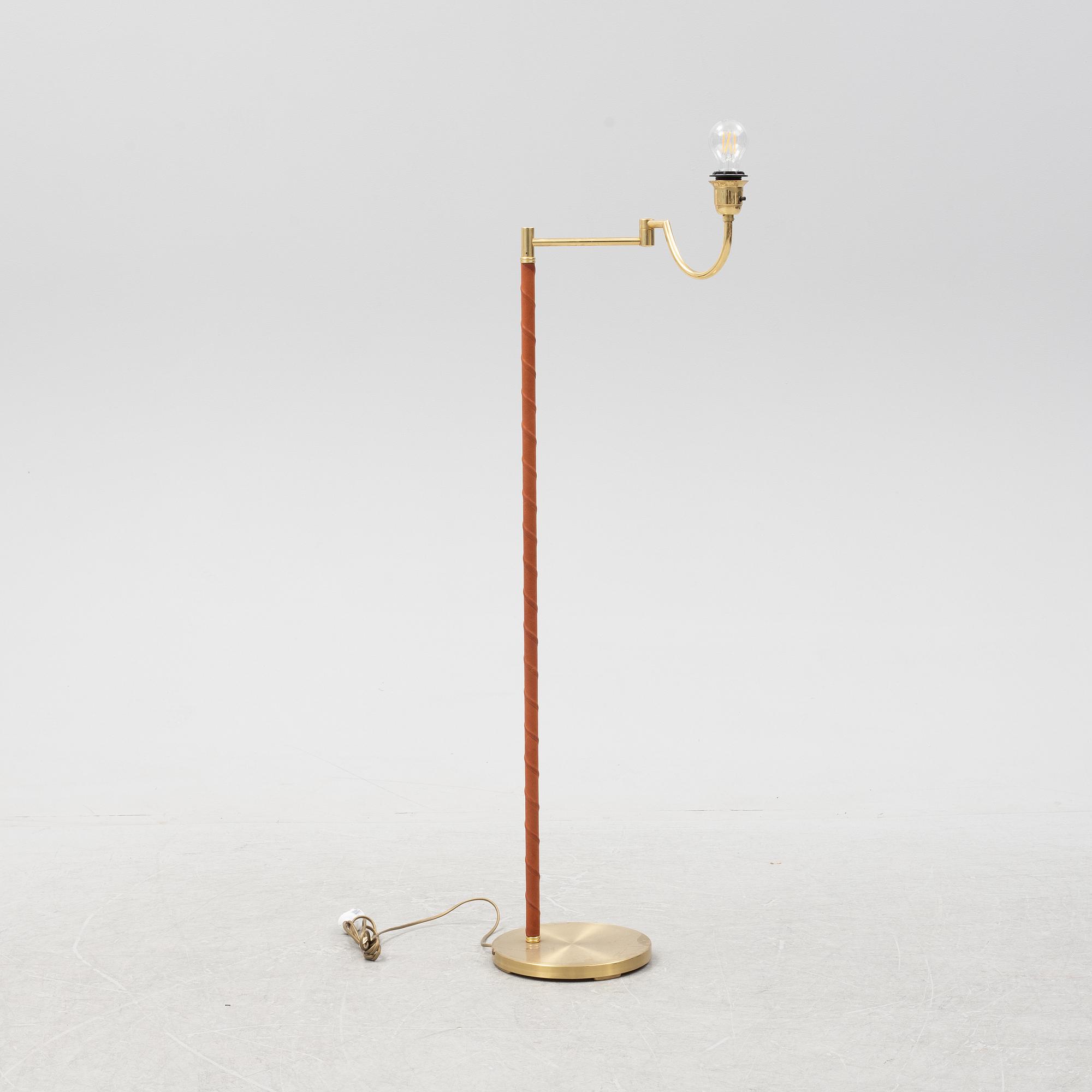 A brass floor lamp from EWÅ, second part of the 20th Century.
