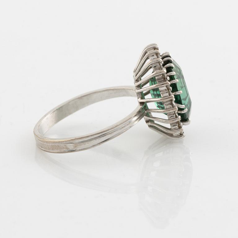Green tourmaline and eight cut diamond cocktail ring.