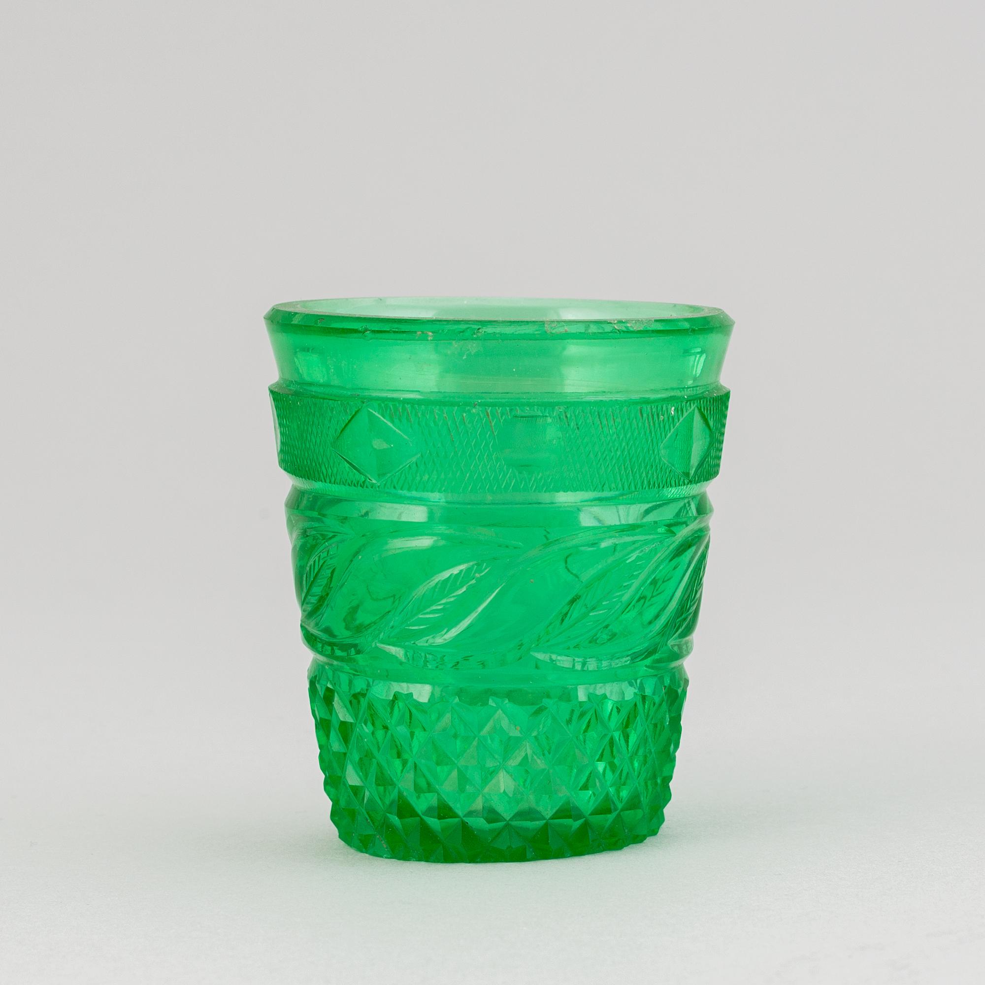 A green tinted cut vodka glass, Russia, Imperial glass manufactory, St Petersburg, 19th Century.