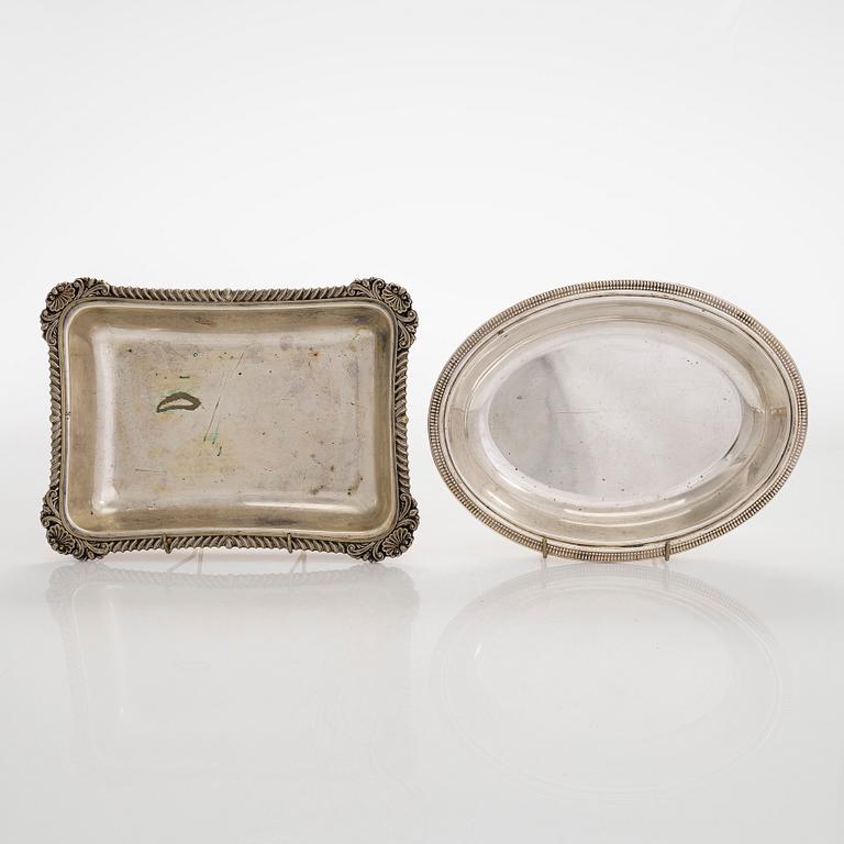 A set of four silver plated entree dishes, England.