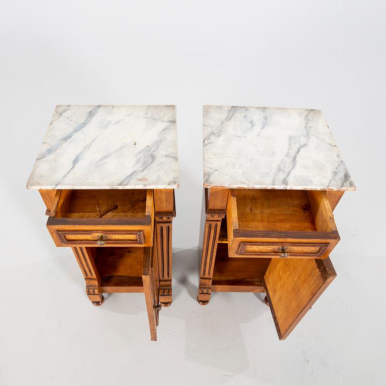 A pair of Neo Renaissance  bedside tables.