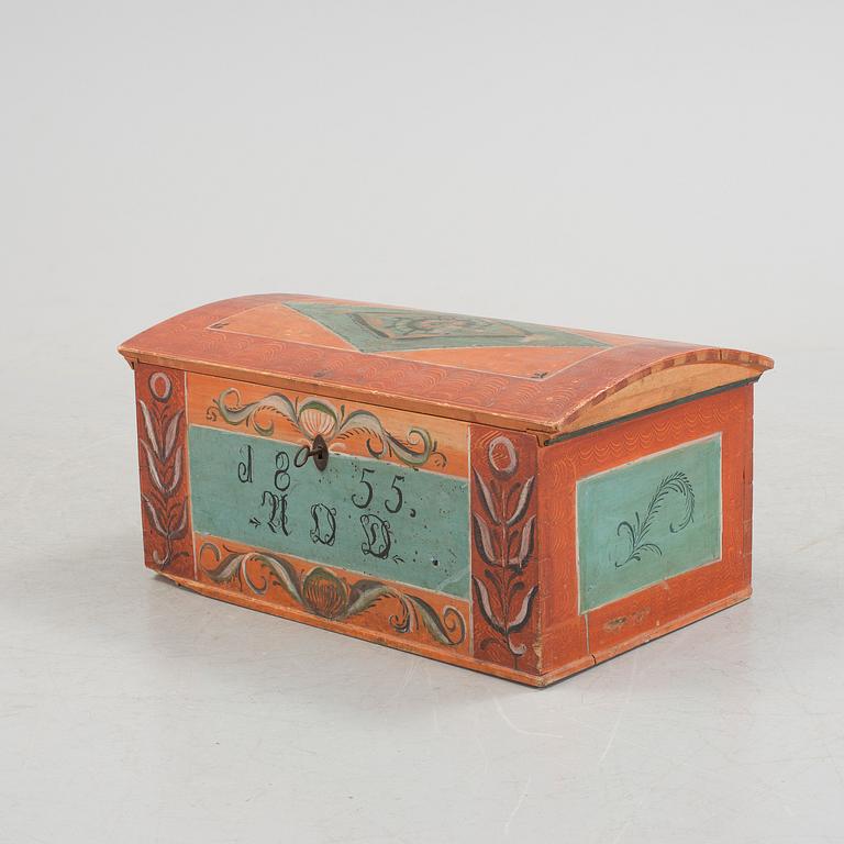 A painted folk art chest from Lima. Dated 1855.