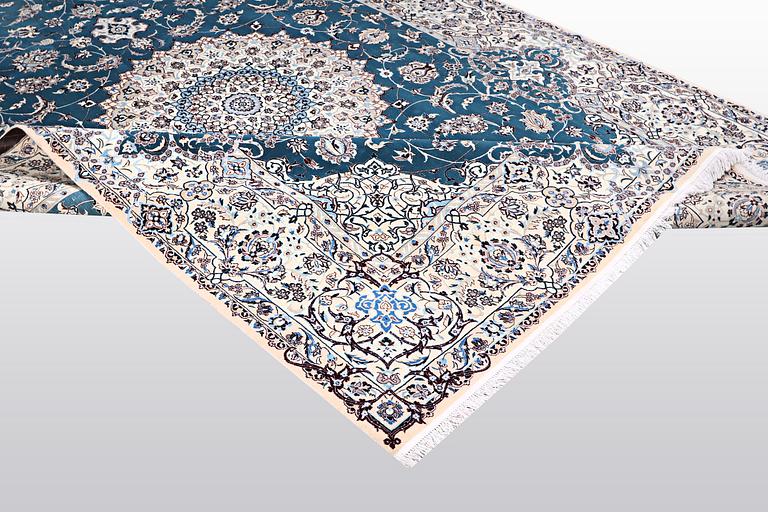 A carpet, Nain, part silk, 6 Laa, ca 312 x 208 cm.