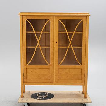 A 1910's/20's vitrine cabinet.