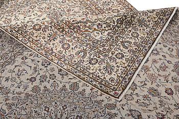 A Kashan carpet, c. 338 x 236 cm.