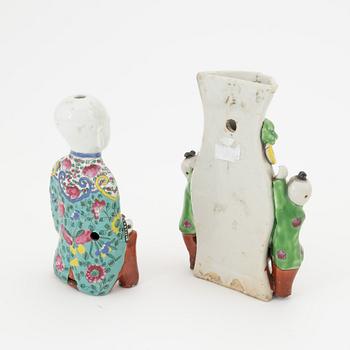 A famille rose porcelain figure and a wall vase, Qing dynasty, 19th Century.