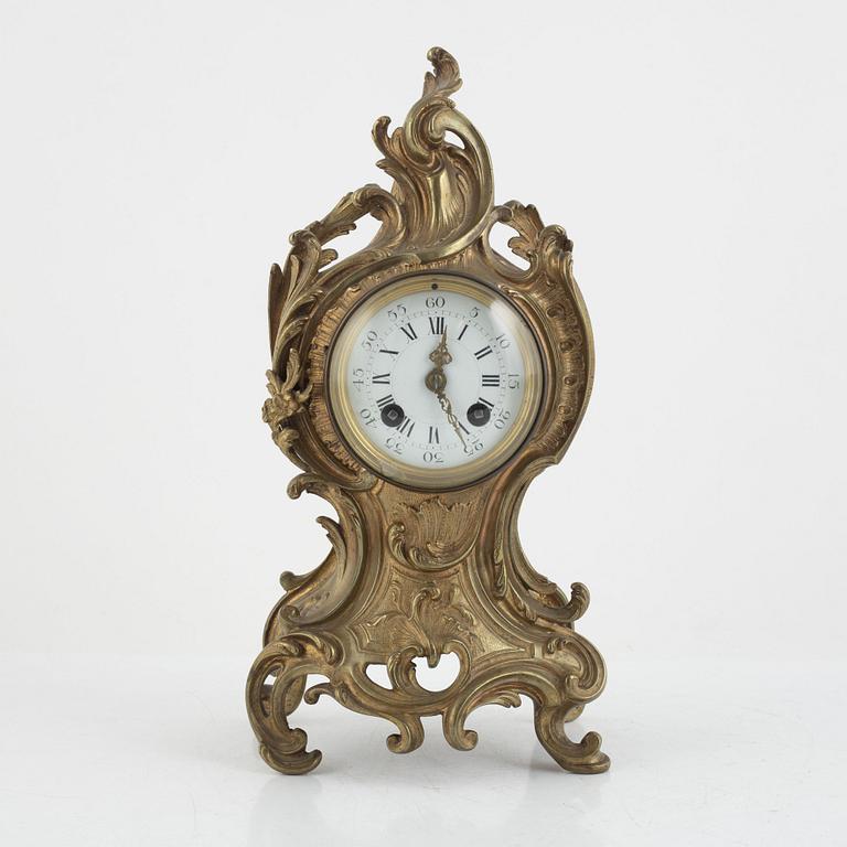A Rococo style mantle clock, circa 1900.