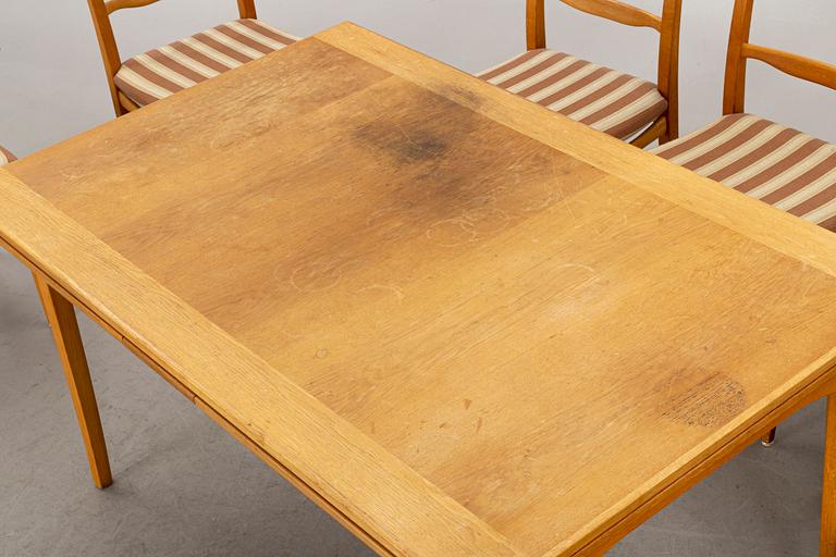 A CARL MALMSTEN DINING TABLE and CHAIRS, 7 parts.