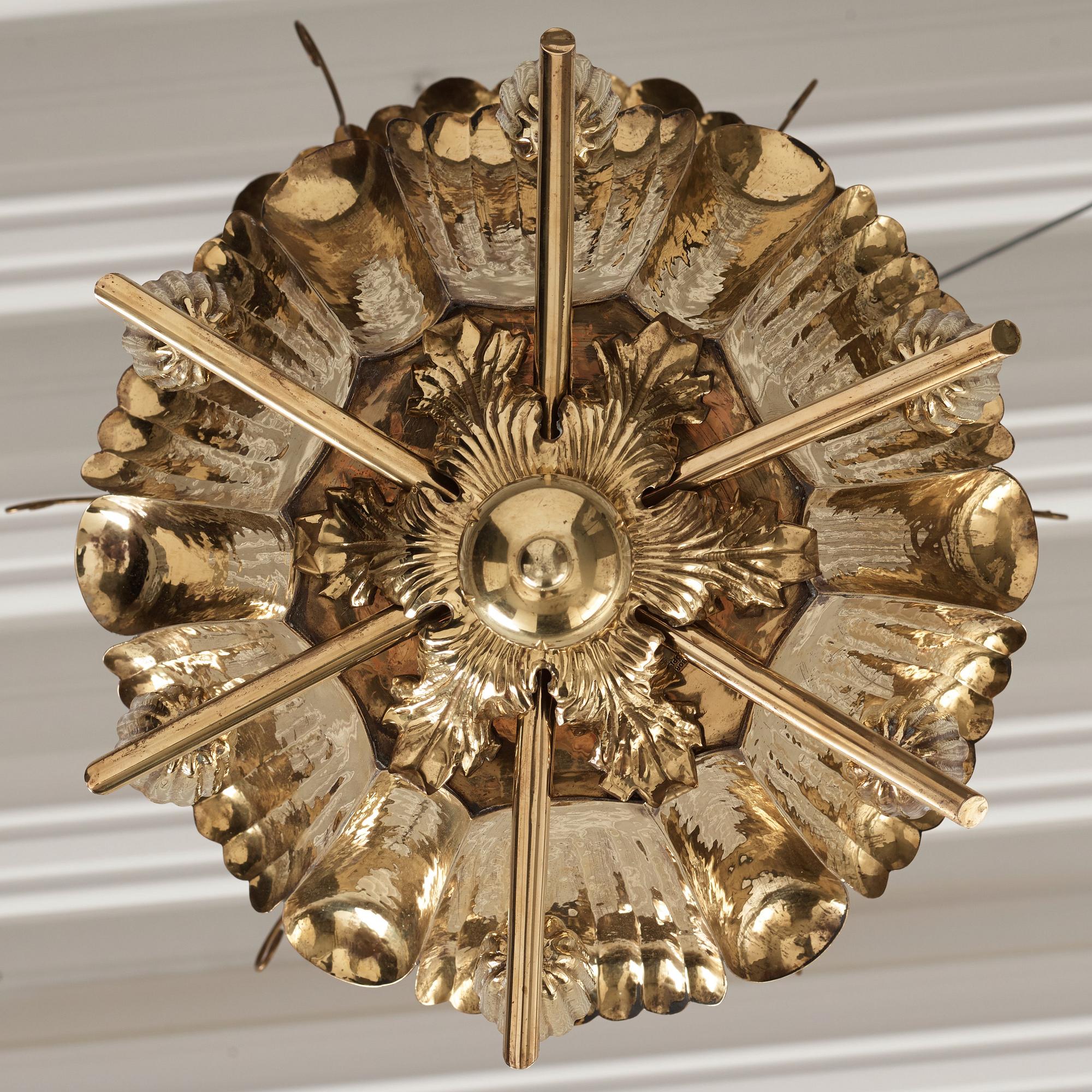 A.W. Borgh, a pair of Swedish Grace brass chandeliers, probably 1920-1930's.