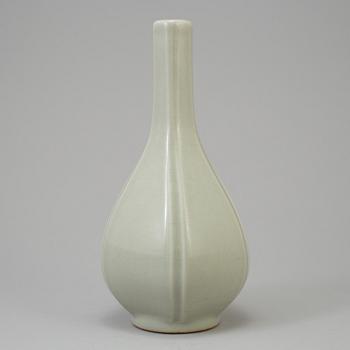 A presumably modern made celadon-glazed vase with Qianlong mark.