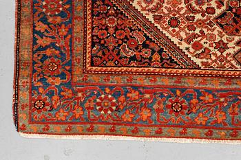 A rug, antique Malayer, ca 201,5 x 131,5 cm.