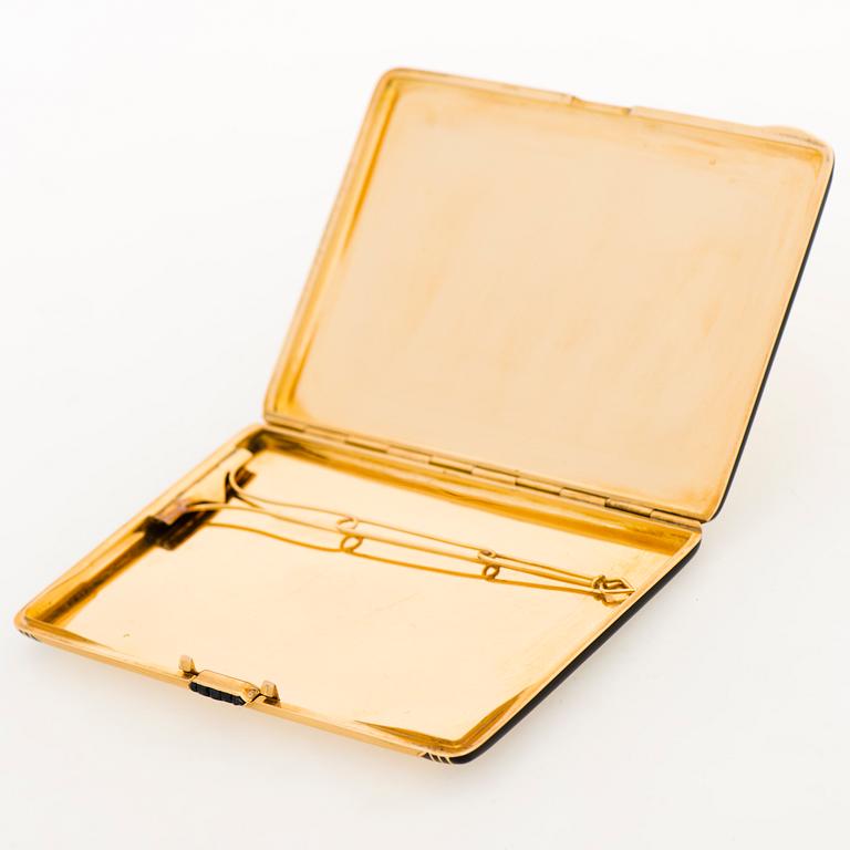 Cartier Art Deco cigarettetui 18K guld med svart emalj och safirer.