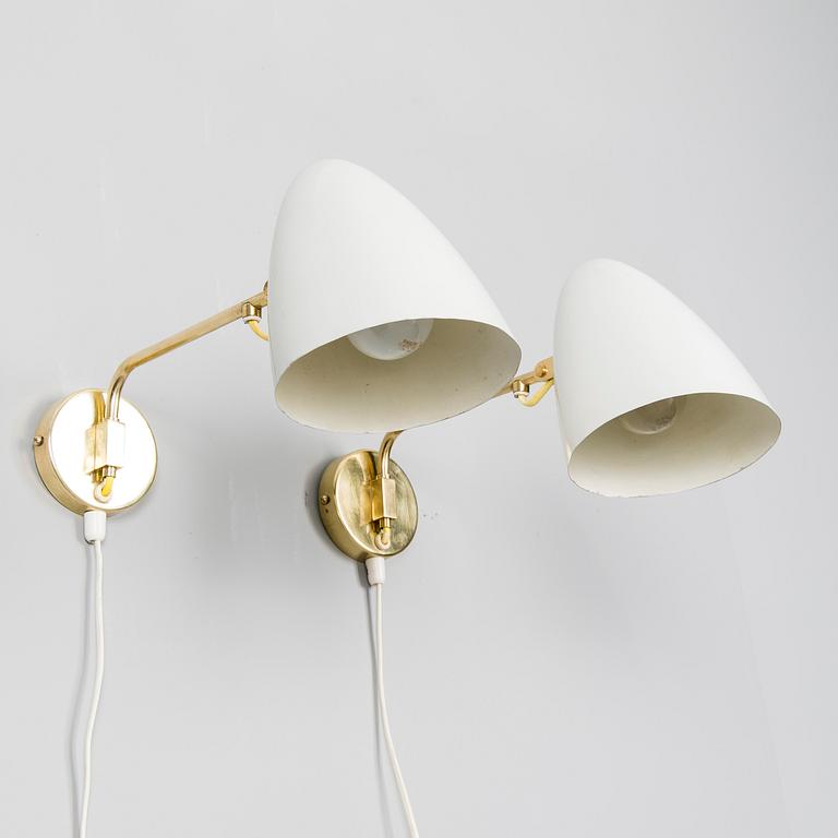 PAAVO TYNELL, A PAIR OF WALL LIGHTS. Marked  Idman. 1950s.