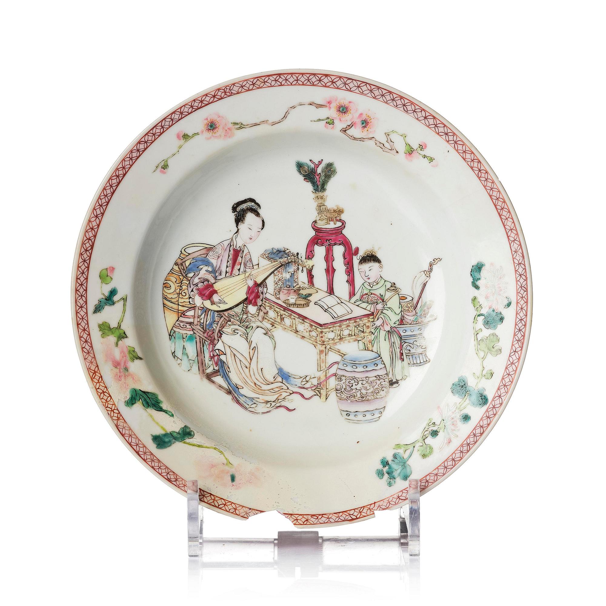 A famille rose ruby-back 'mother and child' plate, Qing dynasty, Yongzheng (1723-35).