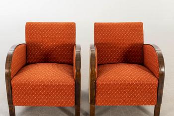 A pair of 1930/40:s Art Deco easy chairs.