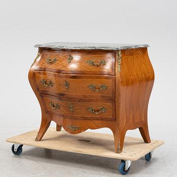 A rococo-style chest of drawers, early 20th century.