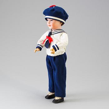 A bisque head boy doll 238 by S.F.B.J, Paris, France, 1910s.