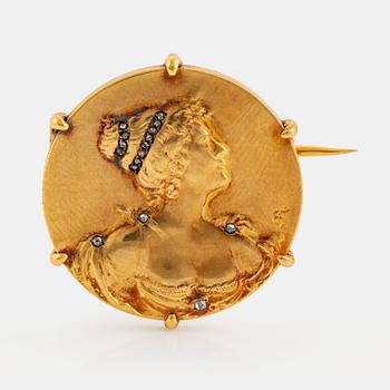 An Epinay de Briort brooch in 18K gold set with rose-cut diamonds.