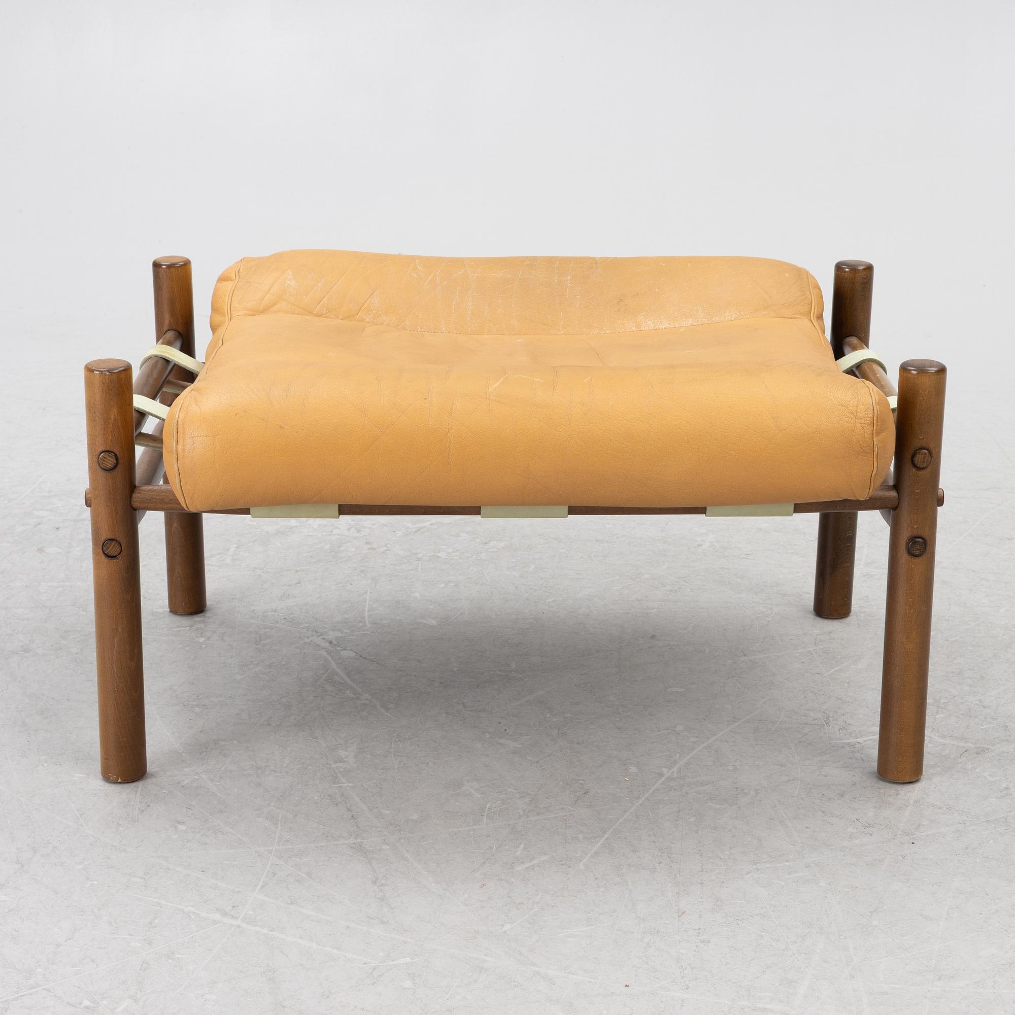 Arne Norell, Armchair with an ottoman, 'Inka', Norell Möbel AB, 1970s.