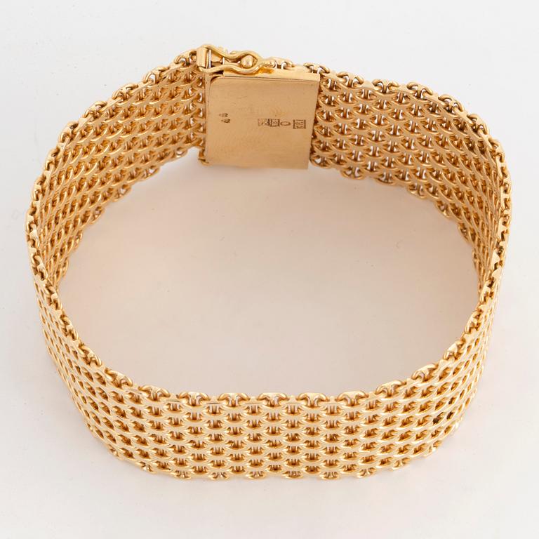 Armband "X-länk" 18K guld.