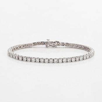 Tennis bracelet, brilliant cut diamonds, 18K white gold.