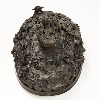 A bronze reticulated incense burner with cover, Qing dynasty (1644-1912).