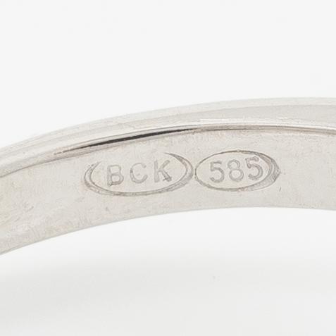 Ring 14K vitguld med turmalin och briljantslipade diamanter.