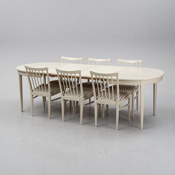A dining table and six chairs by Carl Malmsten for Bodafors.