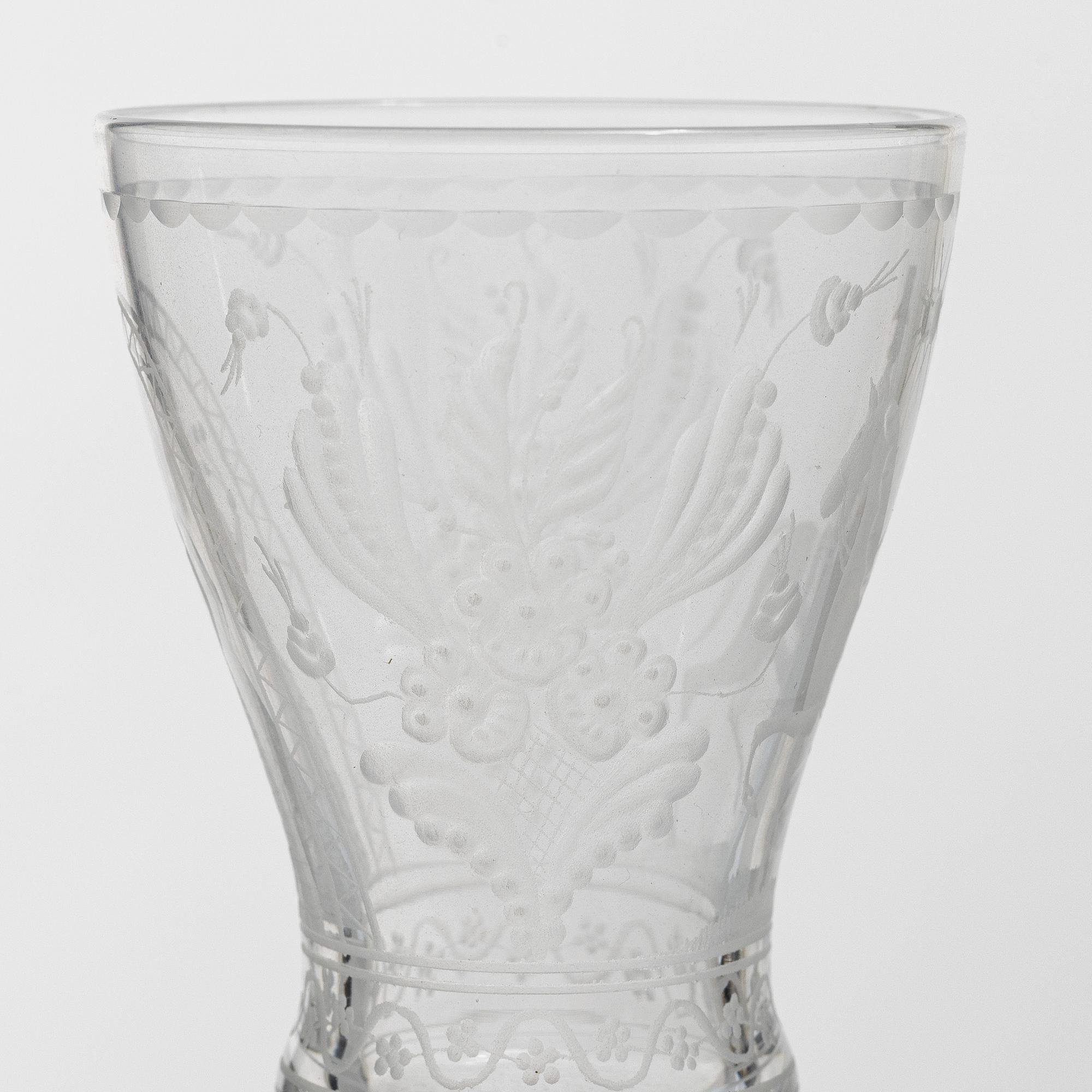 Vicke Lindstrand, nine 'Dalecarlia' sherry glasses, Kosta Boda.