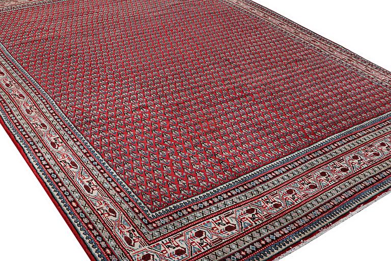 A Sarouk/Boteh carpet, c. 352 x 250 cm.