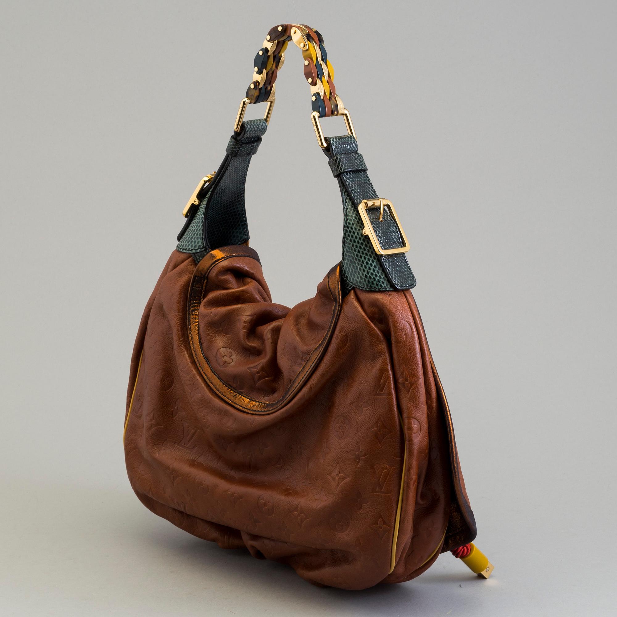 Louis Vuitton Limited Edition Monogram Epices Kalahari GM Bag.