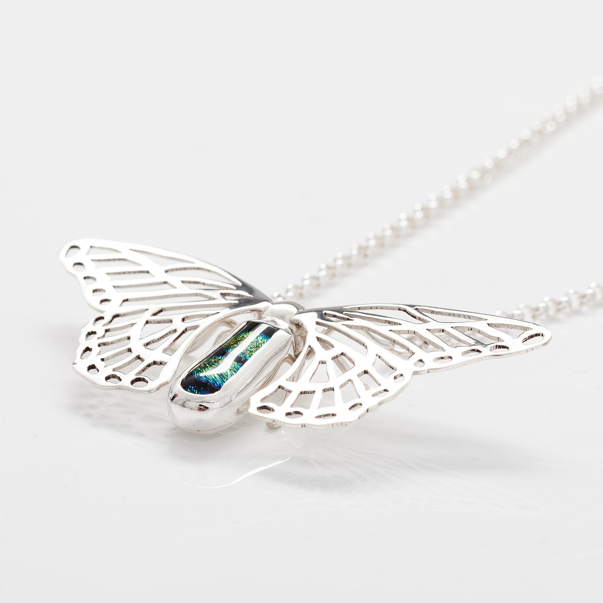 A sterling silver necklace "Butterfly" with dichroic glass. Ru Runeberg 2019.