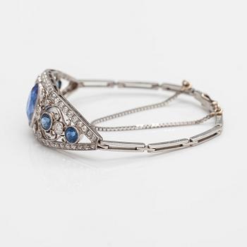 A platinum bracelet with old-cut diamonds ca. 1.46 ct in total, a synthetic sapphire and sapphires. Early 20th century.