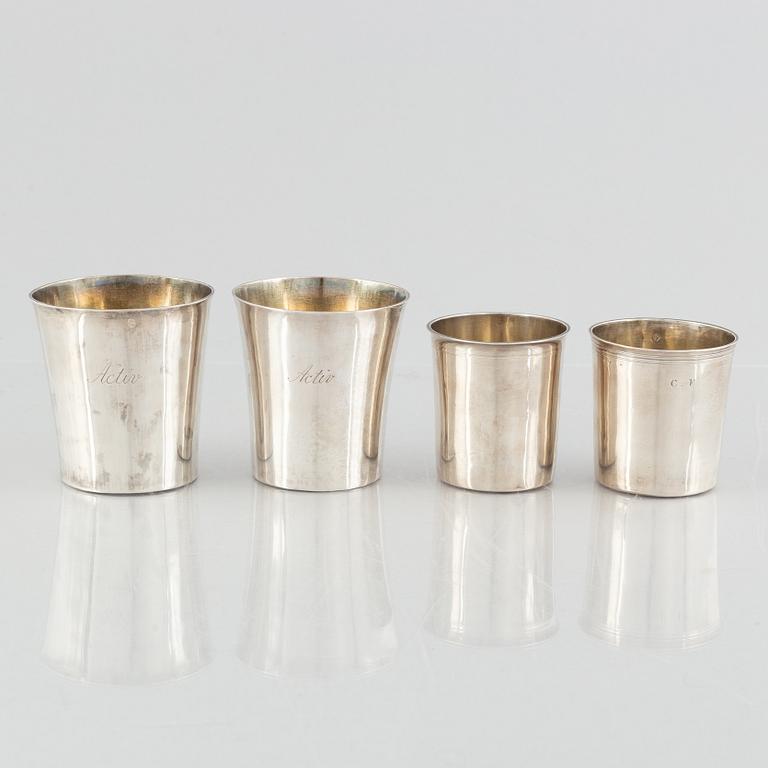 A set of four silver beakers, including Anders Rothman the Younger, Örebro, 1852-54.