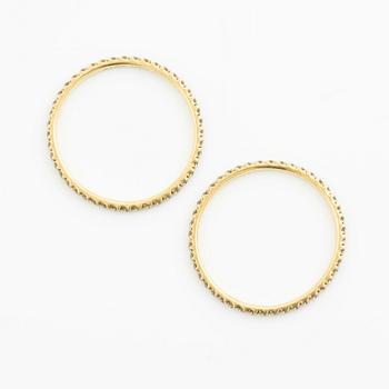 Ringar, Georg Jensen. ett par, "Signature", 18K guld med briljantslipade diamanter.
