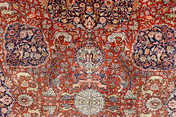A pictoral orietal silk rug, 246 x 153 cm.