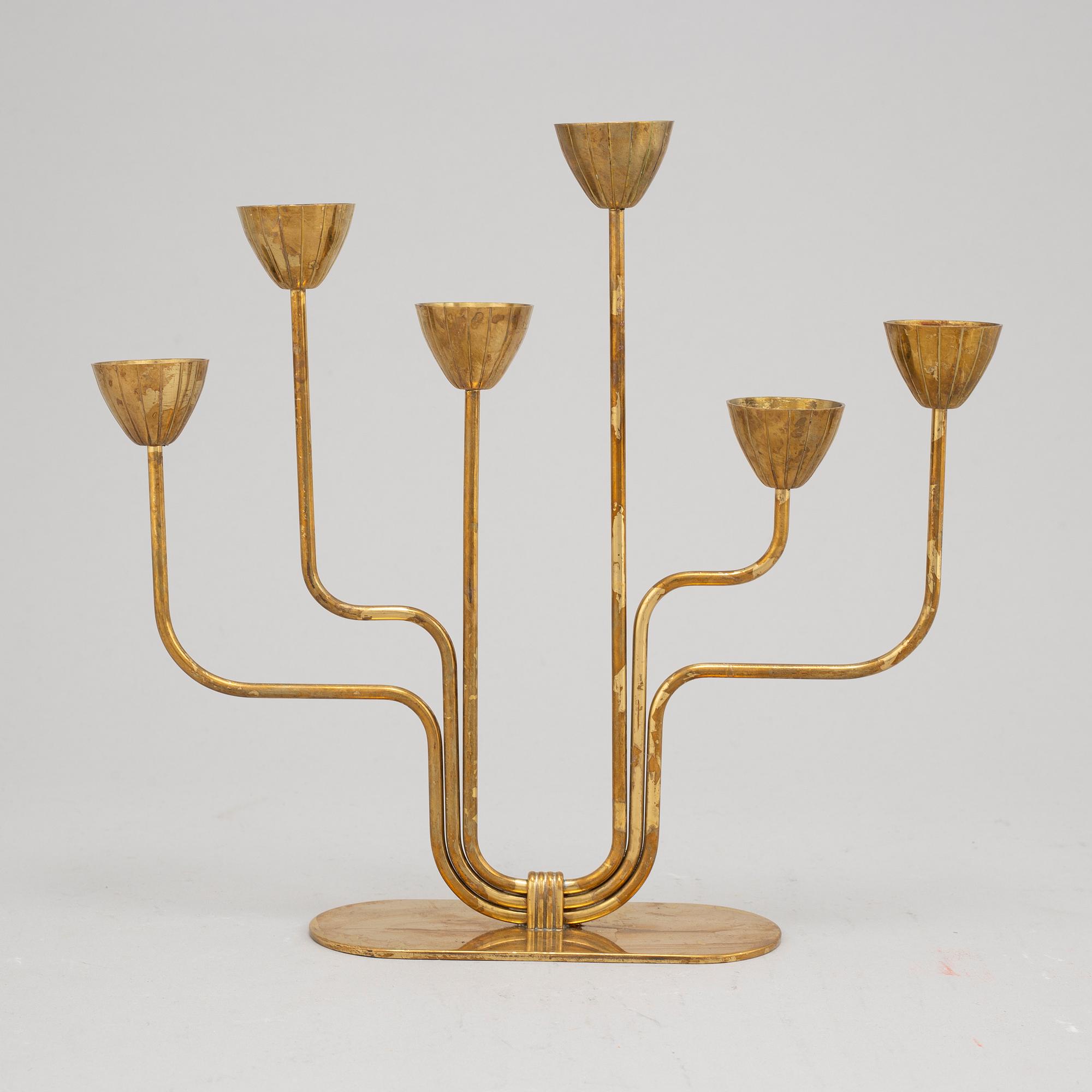 Gunnar Ander, a brass six-light candelabra from Ystad Metall.