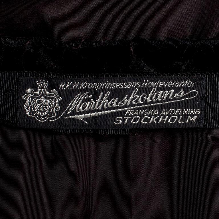 MÄRTHASKOLAN, a black velvet eveningdress.