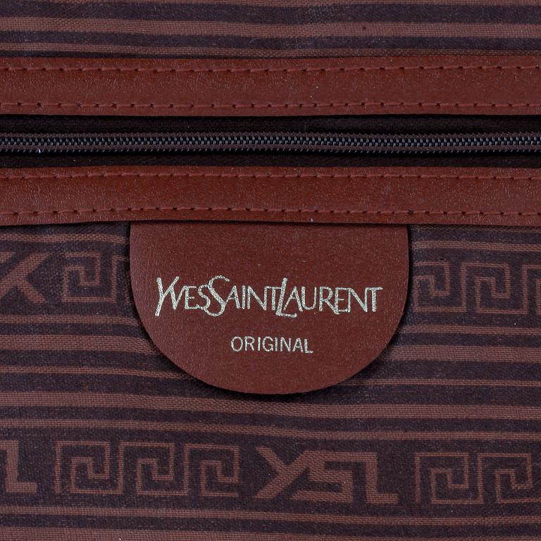 YVES SAINT LAURENT, a black canvas and brown leather suitcase.