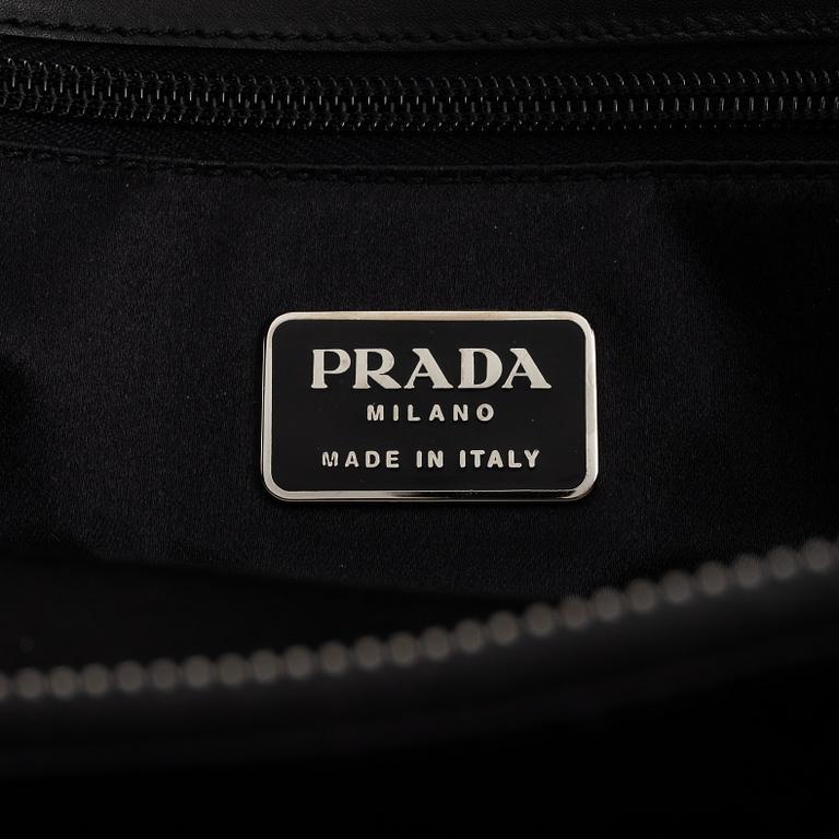 Prada, a black leather bag.