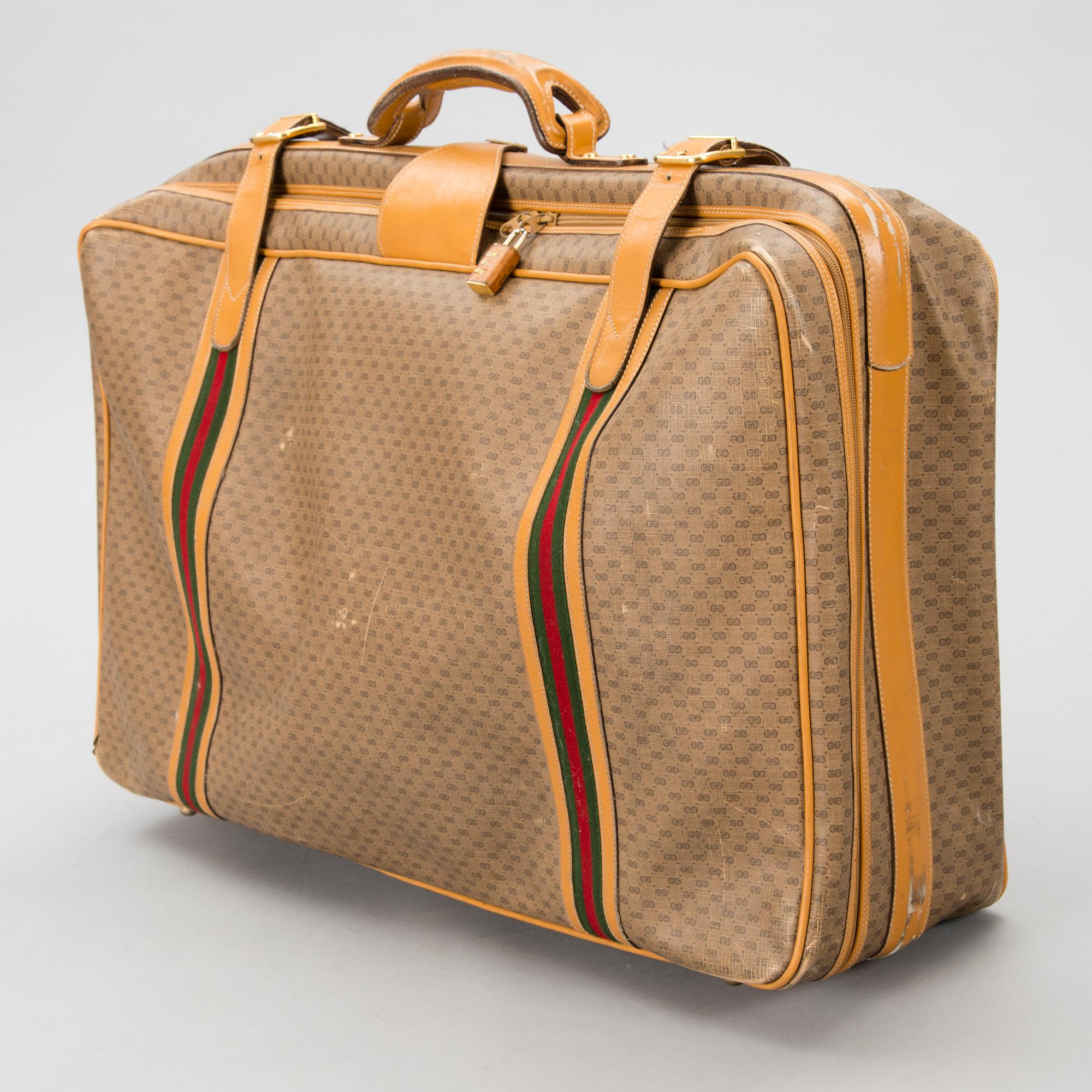 A Large Vintage Micro GG canvas Soft Suitcase.