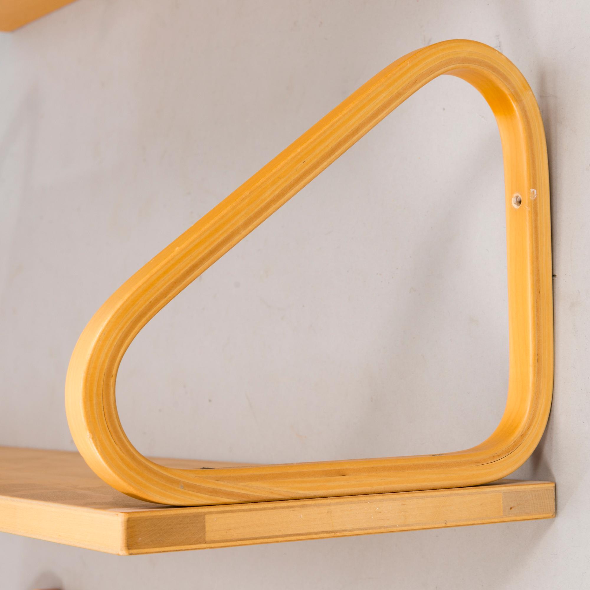 ALVAR AALTO, a set of four '112B' shelves for Artek, latter half of the 20th century.