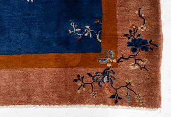 A Chinese art deco carpet, c. 327 x 278 cm.