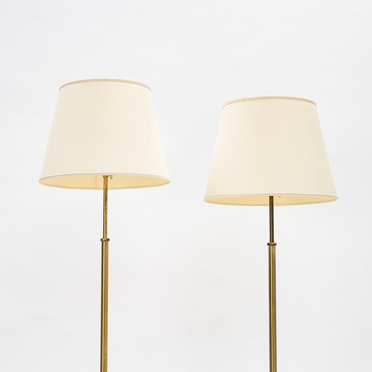 Josef Frank, a pair of model 2326 brass floor lamps, Firma Svenskt Tenn.